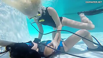 Young Hungarian Lesbians Swim And Pleasure Each Other Underwater In A Pool