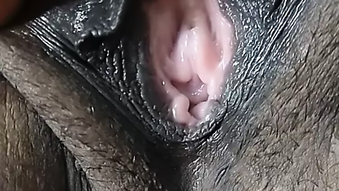 African-American wife's intimate close-up of her genitalia