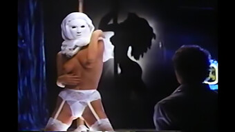 Stripper Performs In A Mask, Followed By Choking A Restrained Man