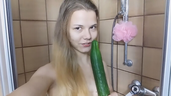 Young and skinny 18-year-old girl masturbates and fucks a cucumber