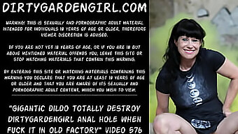 Dirtygardengirl's anal hole stretched to the limit by a massive dildo in a derelict factory