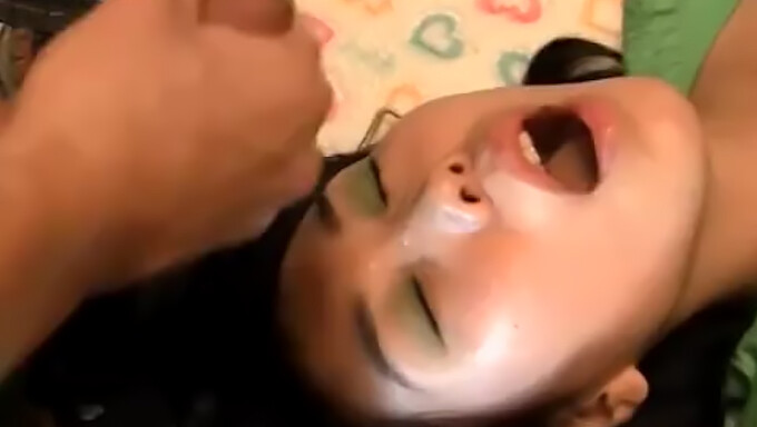 Black-haired Asian women engage in oral and vaginal sex at a gathering