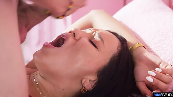 Asian teen gets facial from well-endowed partner