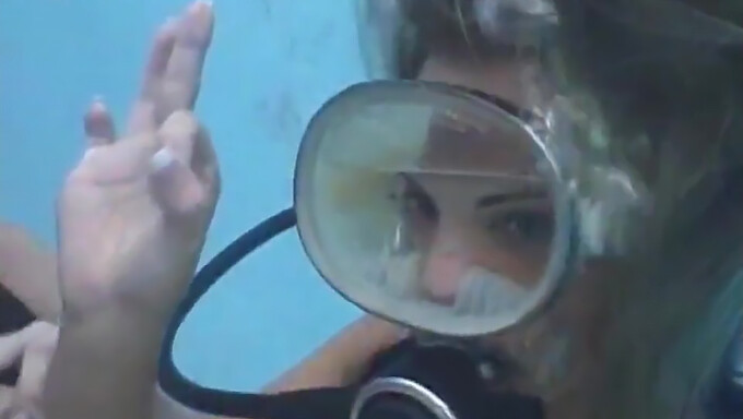 American scuba diver receives facial finish in mask