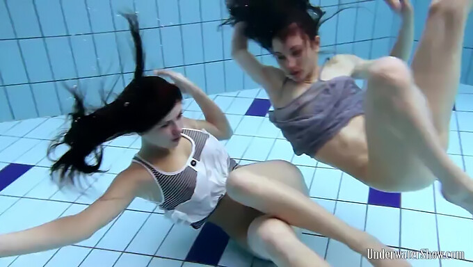 Russian teens Aneta and Janka swim naked in a Czech pool